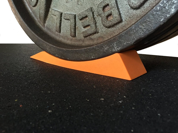 Dead Wedge in use under barbell plate — Stoic Performance