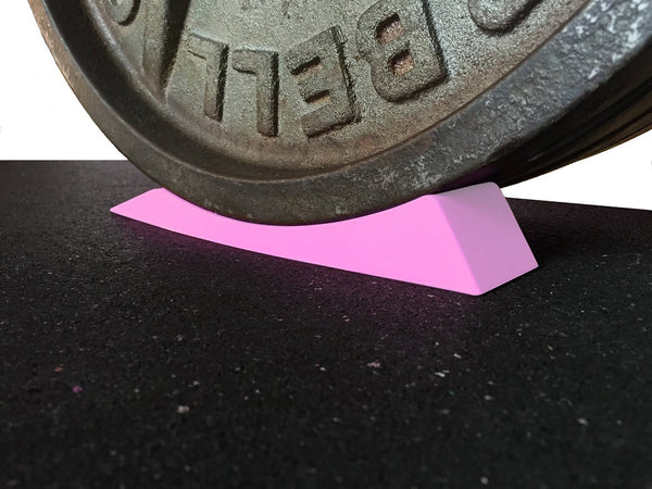 Dead Wedge in use under barbell plate — Stoic Performance