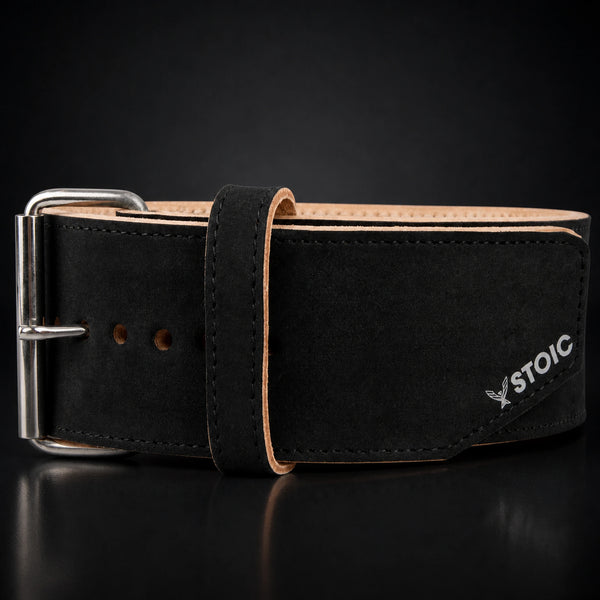 Stoic 10mm single-prong weight lifting belt in black, a close view of the single-prong roller buckle, keeper loop and adjustment holes.