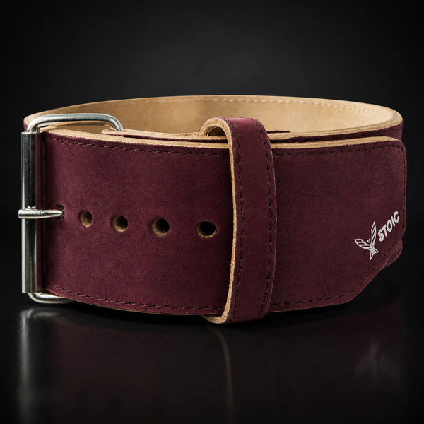 Stoic 10mm single-prong weight lifting belt in maroon, the belt photographed square-on, showing the single-prong roller buckle and the keeper loop.