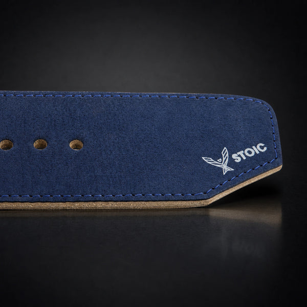 Stoic 10mm single-prong weight lifting belt in navy, a close view of the tail, its adjustment holes and the angled chamfered tip.