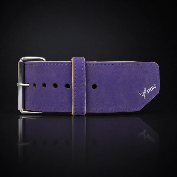 Stoic 10mm single-prong weight lifting belt in purple, a close view of the single-prong roller buckle, keeper loop and adjustment holes.