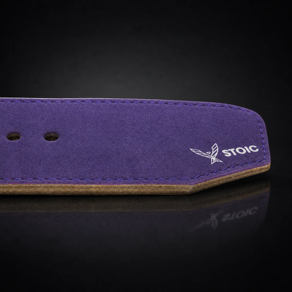 Stoic 10mm single-prong weight lifting belt in purple, a close view of the tail, its adjustment holes and the angled chamfered tip.