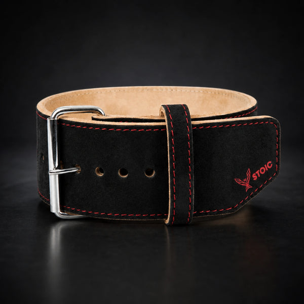 Stoic 10mm single-prong weight lifting belt in Bloodline red and black, the belt photographed square-on, showing the single-prong roller buckle and the keeper loop.