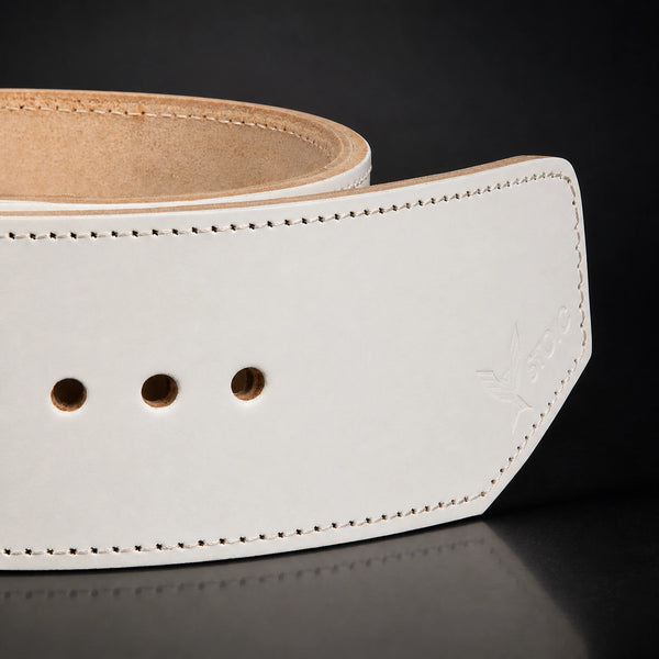 Stoic 10mm single-prong weight lifting belt in white, a close view of the strap, its adjustment holes and the angled tail tip.