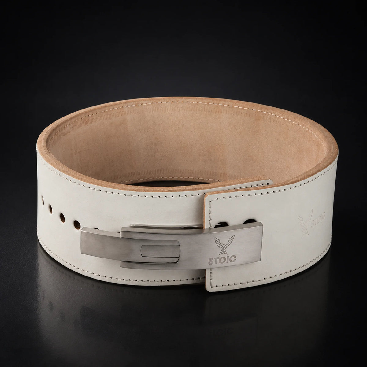 Stoic 13mm lever weight lifting belt in white, on a dark studio background