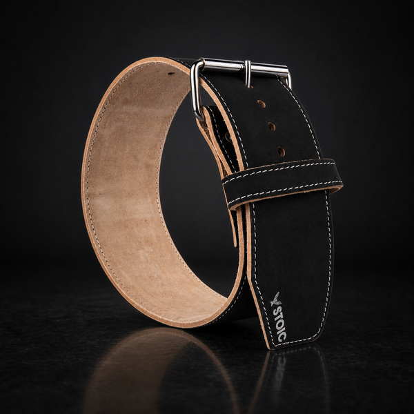Stoic 6.5mm weightlifting belt in black leather, on a dark studio background