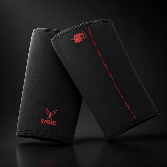 Stoic 7mm knee sleeves for weightlifting in Bloodline, on a dark studio background