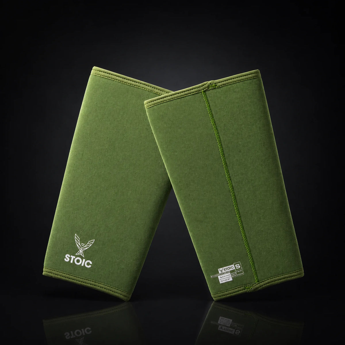 Stoic 7mm knee sleeves for weightlifting in olive drab, on a dark studio background