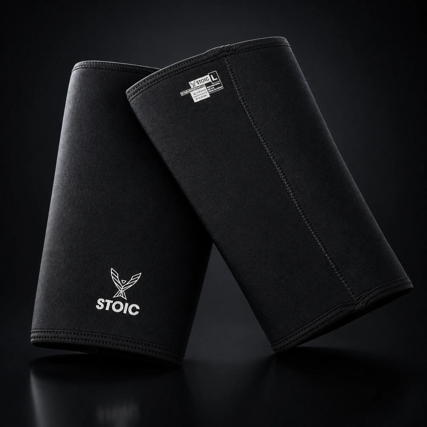 Stoic 7mm knee sleeves for weightlifting, on a dark studio background