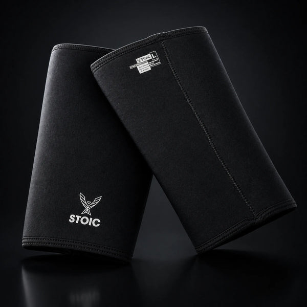Stoic 7mm knee sleeves for weightlifting, on a dark studio background