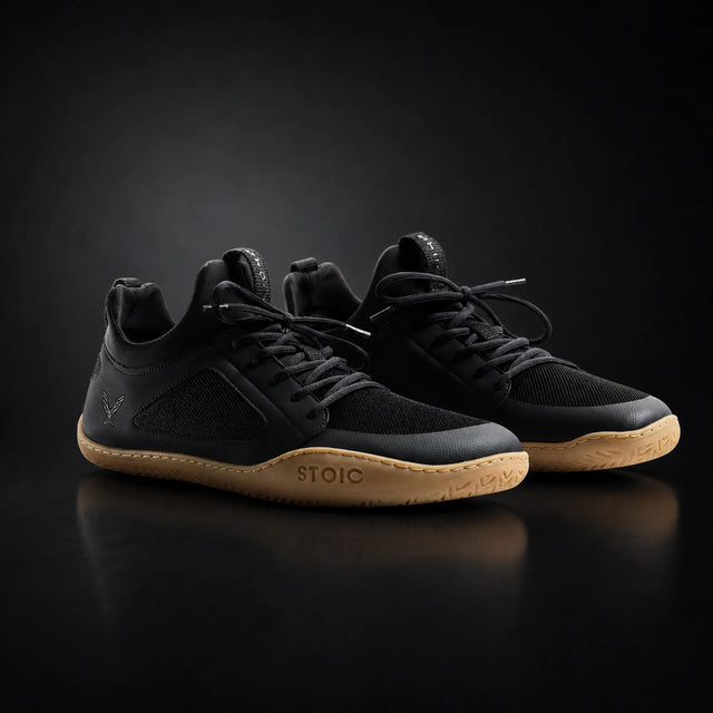 Stoic barefoot trainer zero drop lifting shoe, on a dark studio background