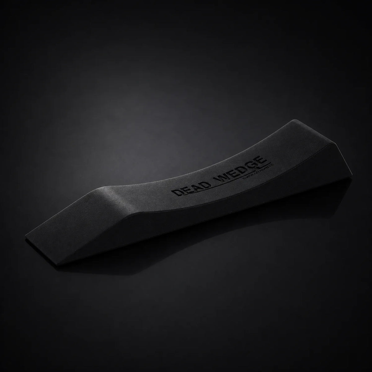 Stoic dead wedge deadlift jack in black, on a dark studio background