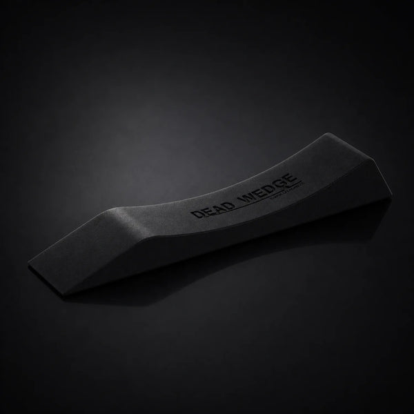 Stoic dead wedge deadlift jack in black, on a dark studio background