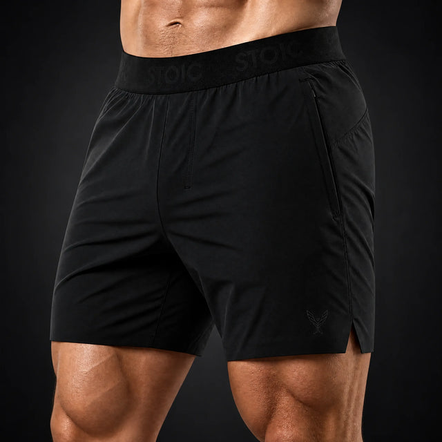 Stoic gym shorts, on a dark studio background
