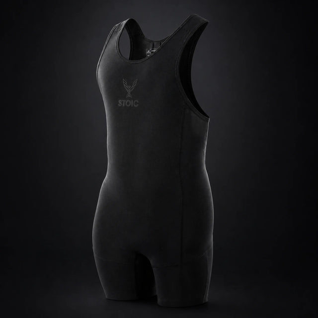 Stoic lifting singlet in Black Label, on a dark studio background