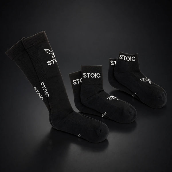 Stoic lifting socks, on a dark studio background