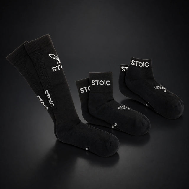 Stoic lifting socks, on a dark studio background