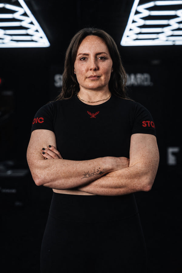 Stoic Competition Crop Top - Bloodline — front view, second model — black with red logo — Stoic Performance