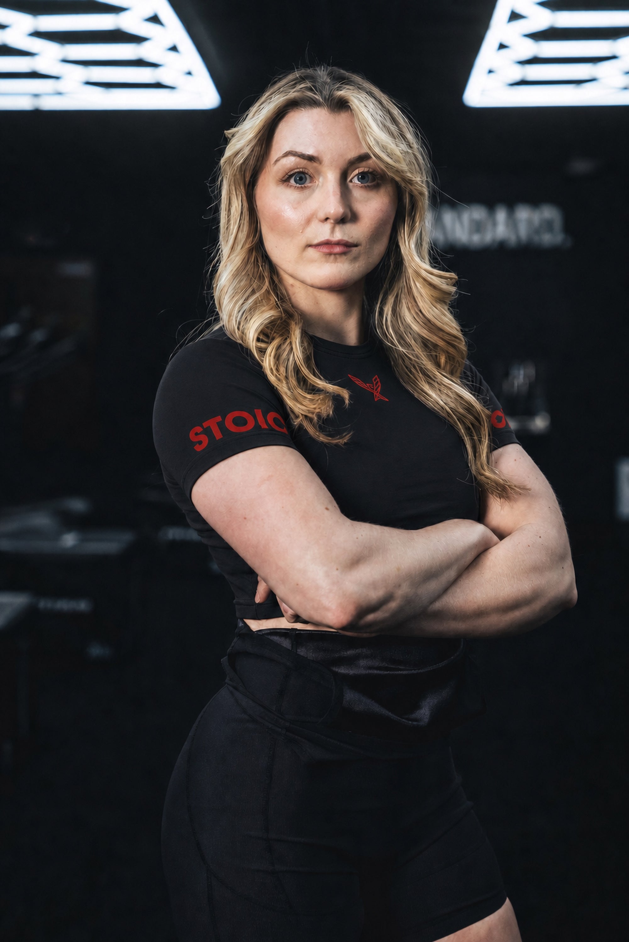 Stoic Competition Crop Top - Bloodline — three-quarter view — black with red logo — Stoic Performance