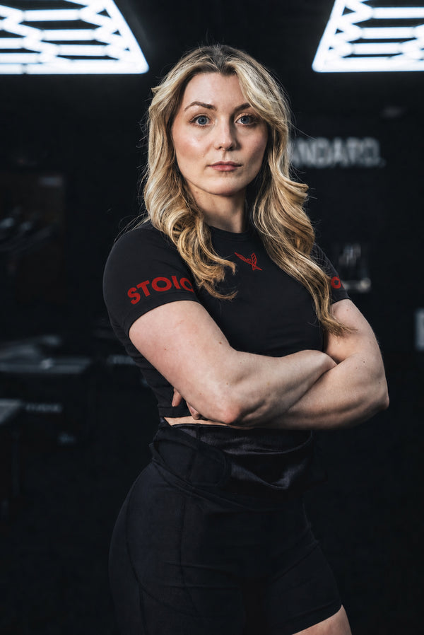 Stoic Competition Crop Top - Bloodline — three-quarter view — black with red logo — Stoic Performance