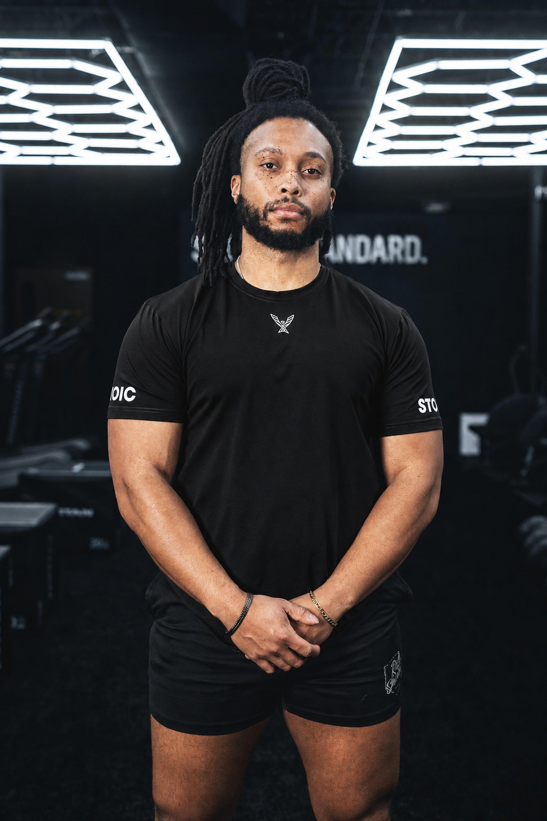 Stoic Competition T-Shirt in black, front view on lifter in gym