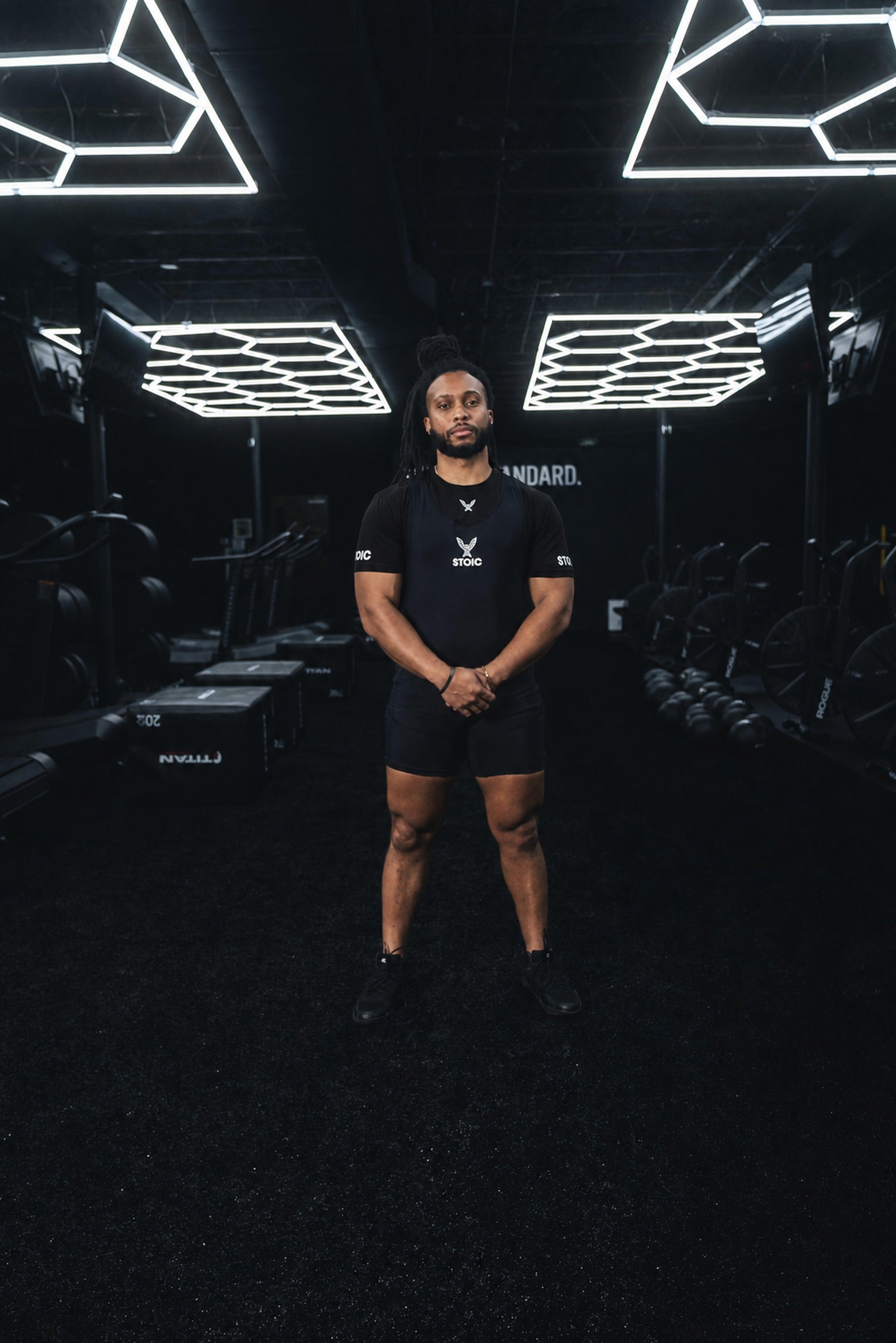 Lifter in the black Stoic Competition T-Shirt on the gym floor