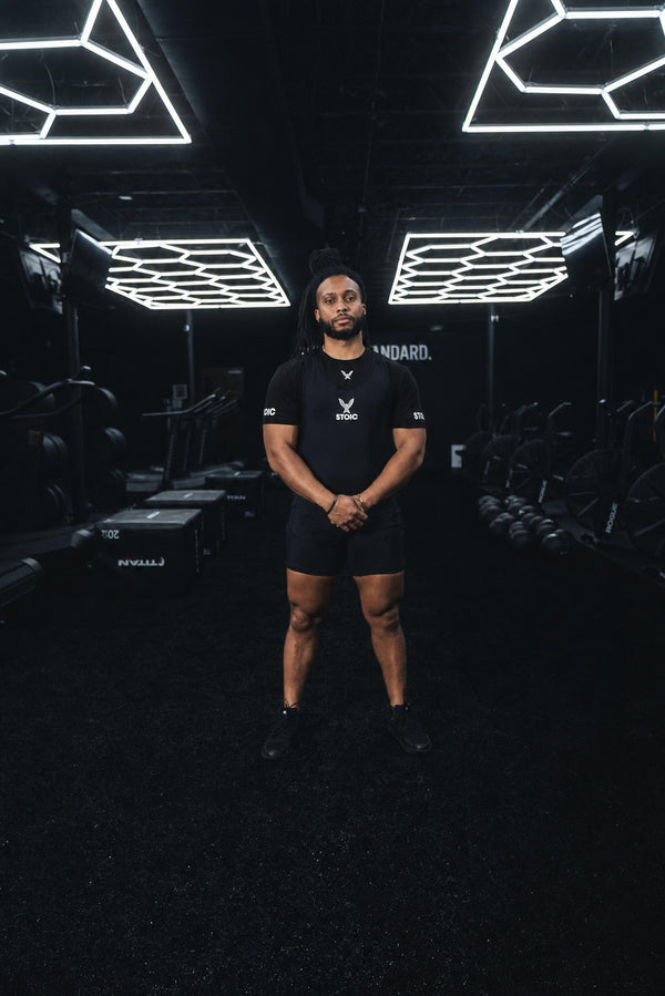Lifter in the black Stoic Competition T-Shirt on the gym floor