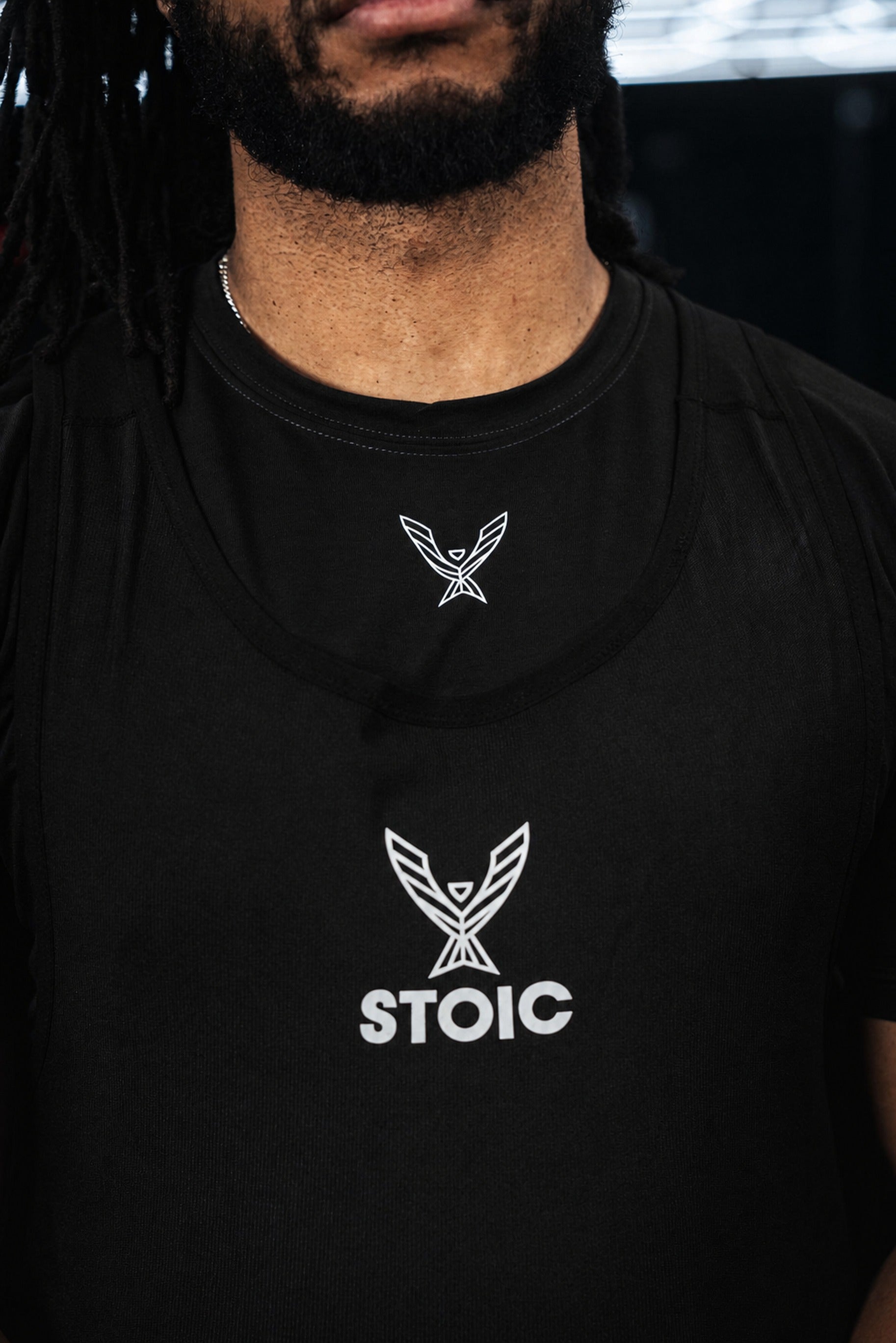 Black Stoic Competition T-Shirt worn under a singlet